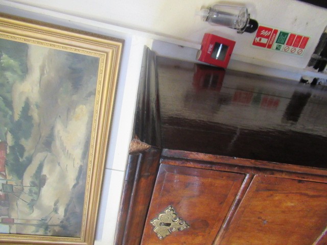 A GEORGIAN WALNUT AND BANDED CHEST ON STAND Image