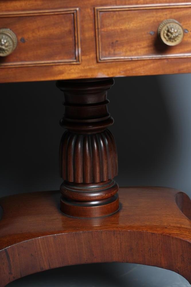 A GEORGE IV MAHOGANY AND ROSEWOOD BANDED SOFA TABLE Image
