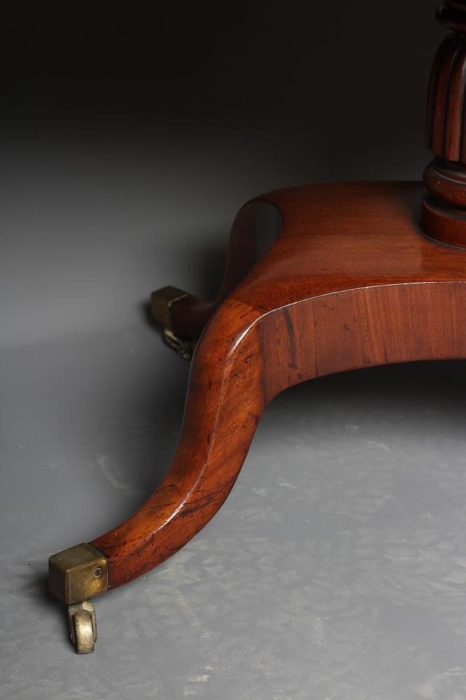 A GEORGE IV MAHOGANY AND ROSEWOOD BANDED SOFA TABLE Image
