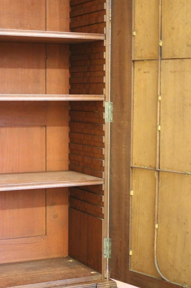 A REGENCY MAHOGANY SECRETAIRE BOOKCASE Image