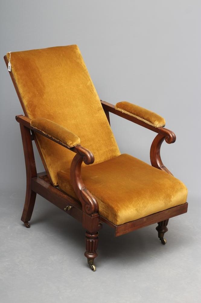 AN EARLY VICTORIAN MAHOGANY LIBRARY CHAIR upholstered in mustard dralon Image