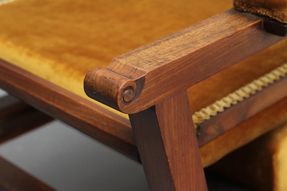 AN EARLY VICTORIAN MAHOGANY LIBRARY CHAIR upholstered in mustard dralon Image