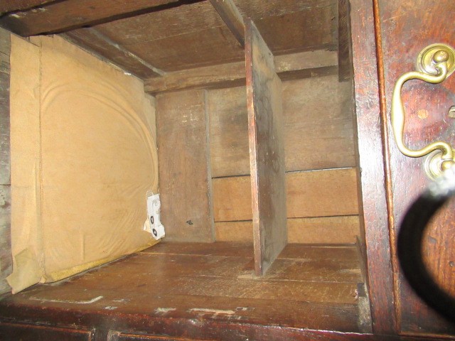 A GEORGIAN OAK ENCLOSED DRESSER Image
