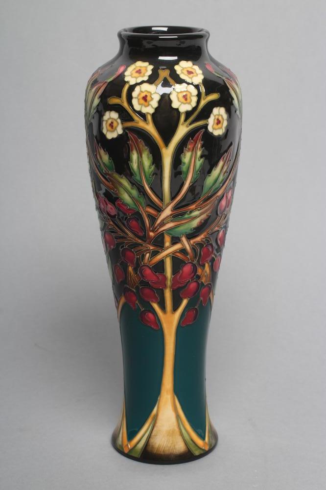 A MOORCROFT POTTERY "FLOWER AND BERRY" PATTERN VASE Image