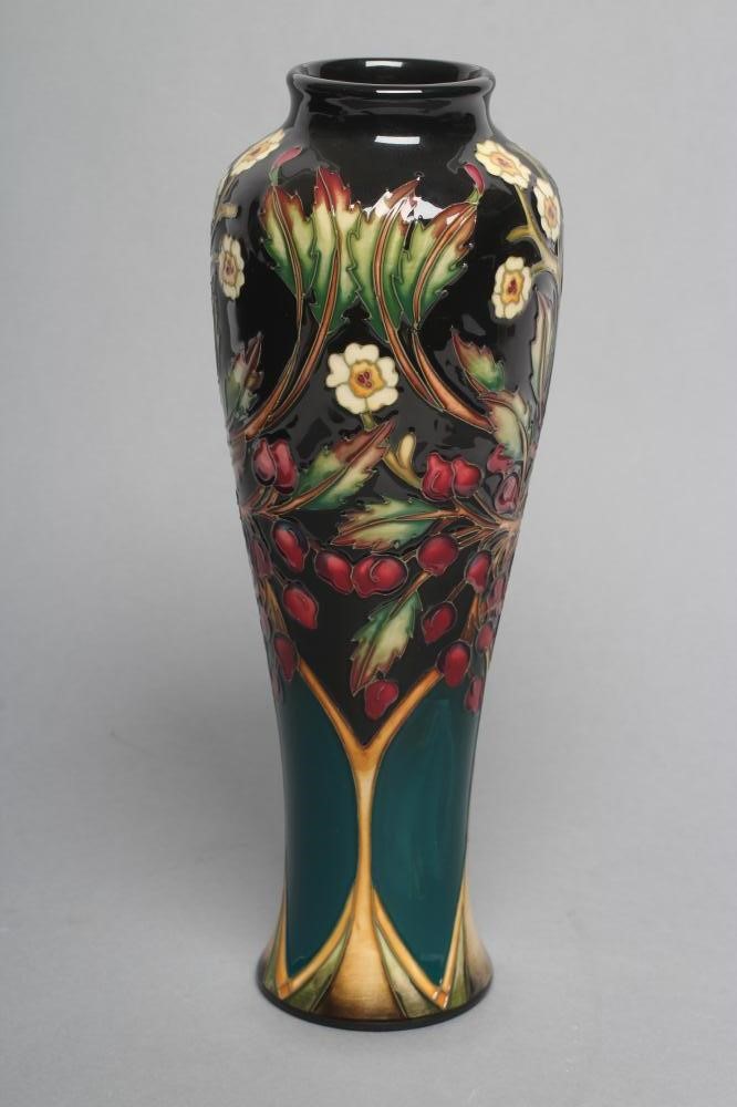 A MOORCROFT POTTERY "FLOWER AND BERRY" PATTERN VASE Image
