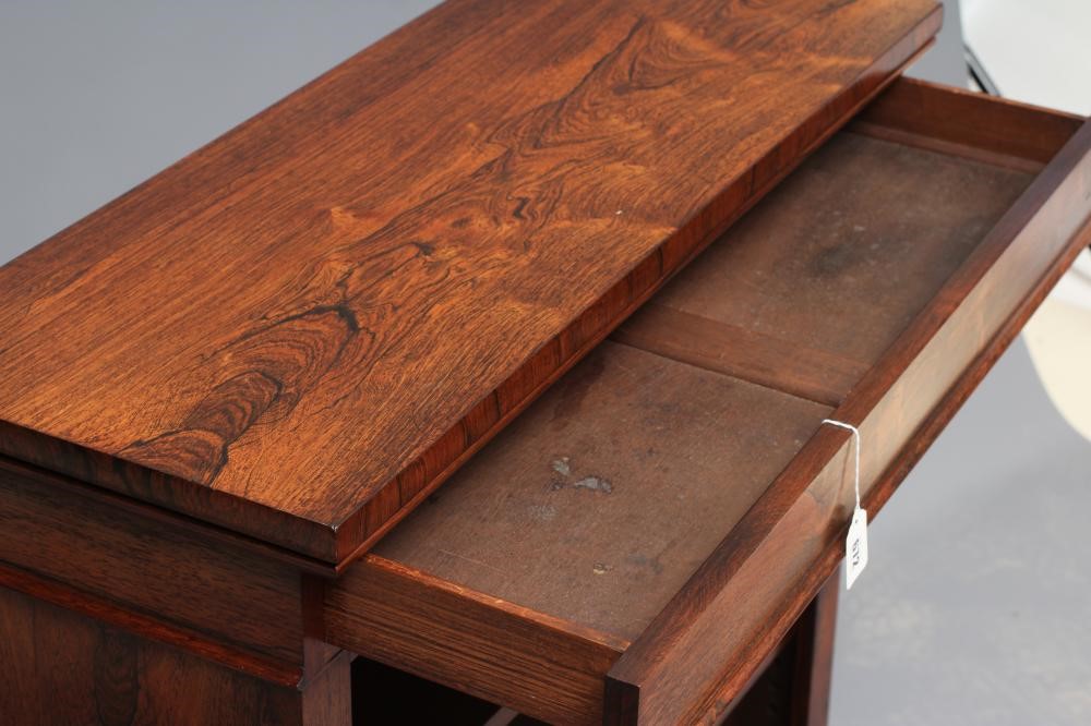 A SMALL REGENCY ROSEWOOD OPEN BOOKCASE Image