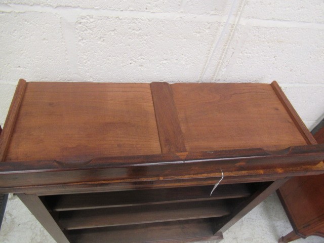 A SMALL REGENCY ROSEWOOD OPEN BOOKCASE Image
