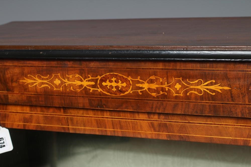 A VICTORIAN WALNUT PIER CABINET of shallow oblong form with ebony trim Image
