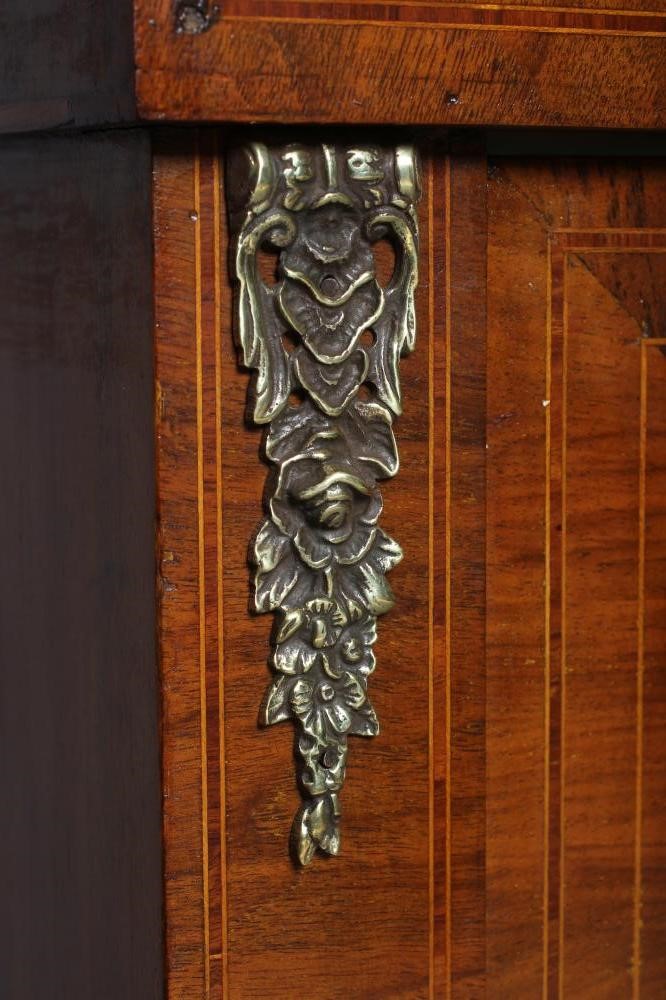 A VICTORIAN WALNUT PIER CABINET of shallow oblong form with ebony trim Image