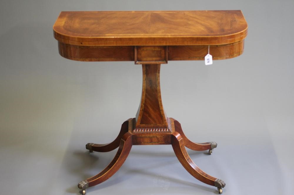 A REGENCY STYLE FOLDING CARD TABLE Image
