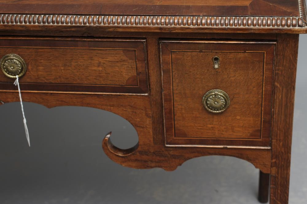 AN OAK AND MAHOGANY LOW BOY Image