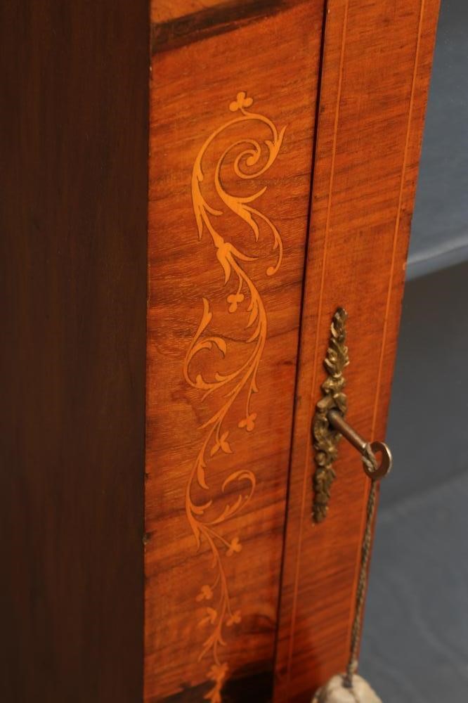 A VICTORIAN WALNUT PIER DISPLAY CABINET with marquetry floral strapwork Image