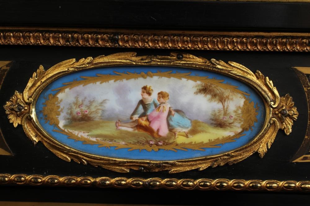 A VICTORIAN EBONISED AND BRASS INLAID PIER DISPLAY CABINET with gilt metal mounts and inset blue Image