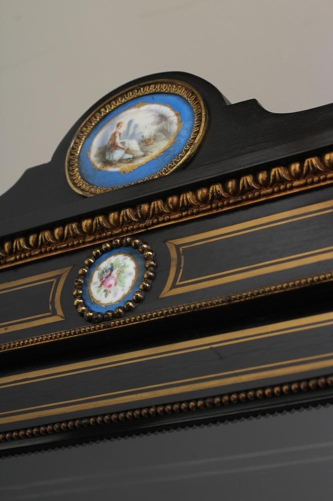 A VICTORIAN EBONISED AND BRASS INLAID PIER DISPLAY CABINET with gilt metal mounts and inset blue Image