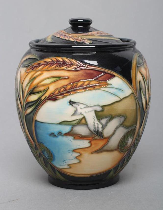 A MOORCROFT POTTERY "LANDSCAPE MEDLEY" PATTERN JAR AND COVER Image