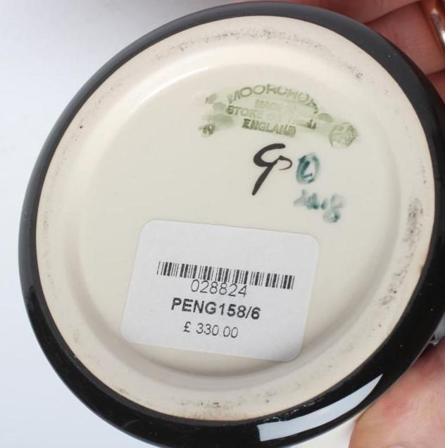 A MOORCROFT POTTERY "PENGUIN FRIEZE" PATTERN VASE Image