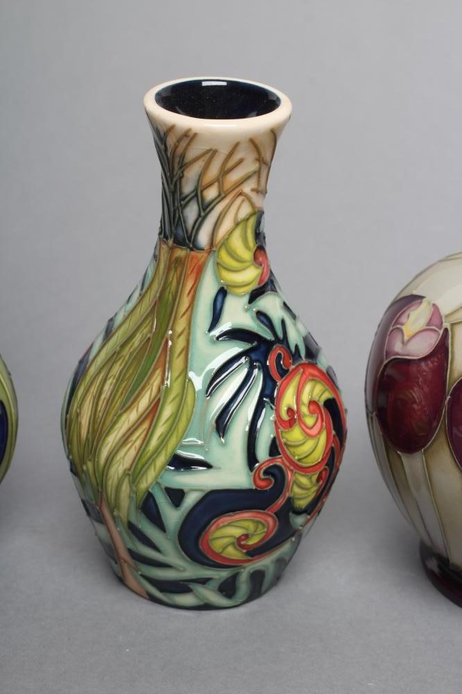 THREE MOORCROFT POTTERY SMALL VASES Image