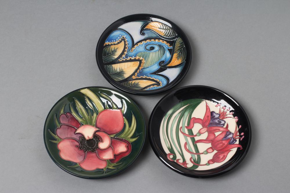 THREE MOORCROFT POTTERY PIN TRAYS comprising "Anemone Tribute" designed by Emma Bossons Image