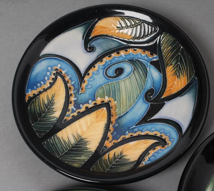 THREE MOORCROFT POTTERY PIN TRAYS comprising "Anemone Tribute" designed by Emma Bossons Image