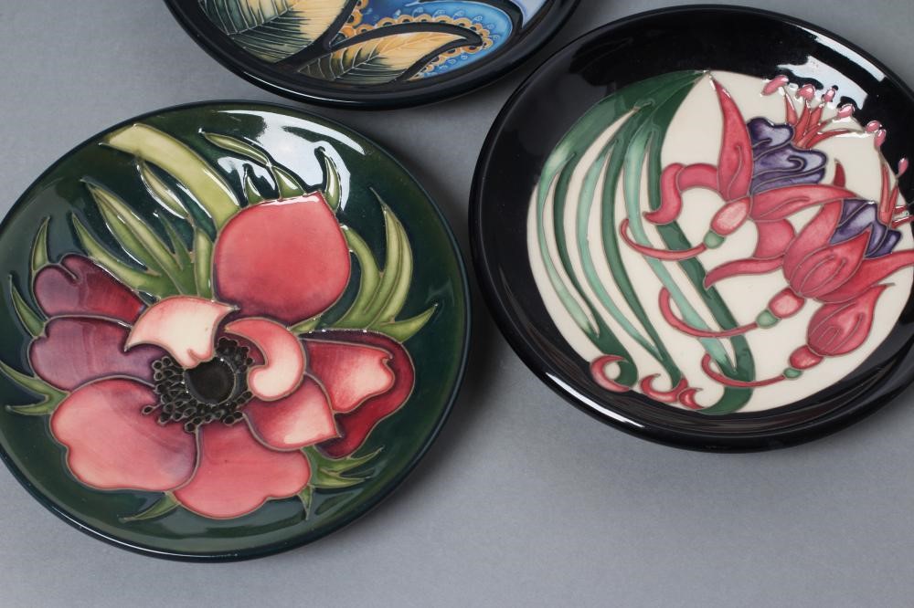 THREE MOORCROFT POTTERY PIN TRAYS comprising "Anemone Tribute" designed by Emma Bossons Image