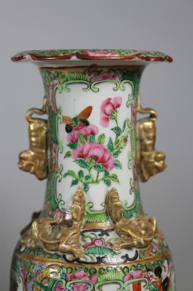 A PAIR OF CANTONESE PORCELAIN VASES Image