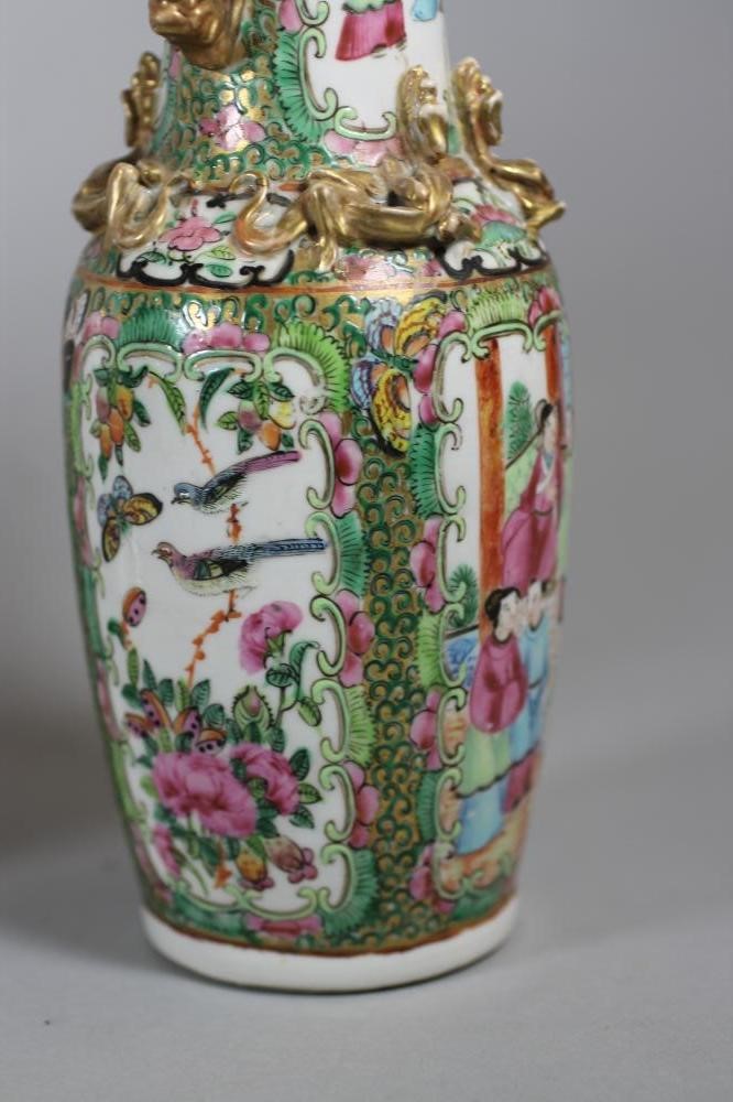 A PAIR OF CANTONESE PORCELAIN VASES Image