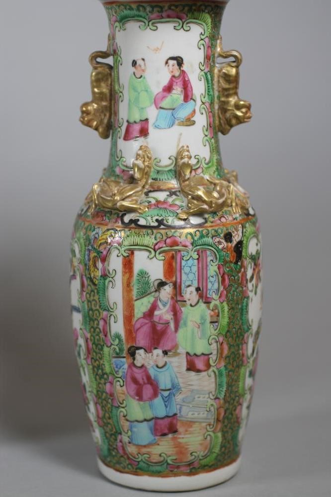 A PAIR OF CANTONESE PORCELAIN VASES Image