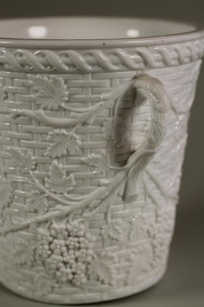 A WHITE OPAQUE GLASS CACHE-POT Image