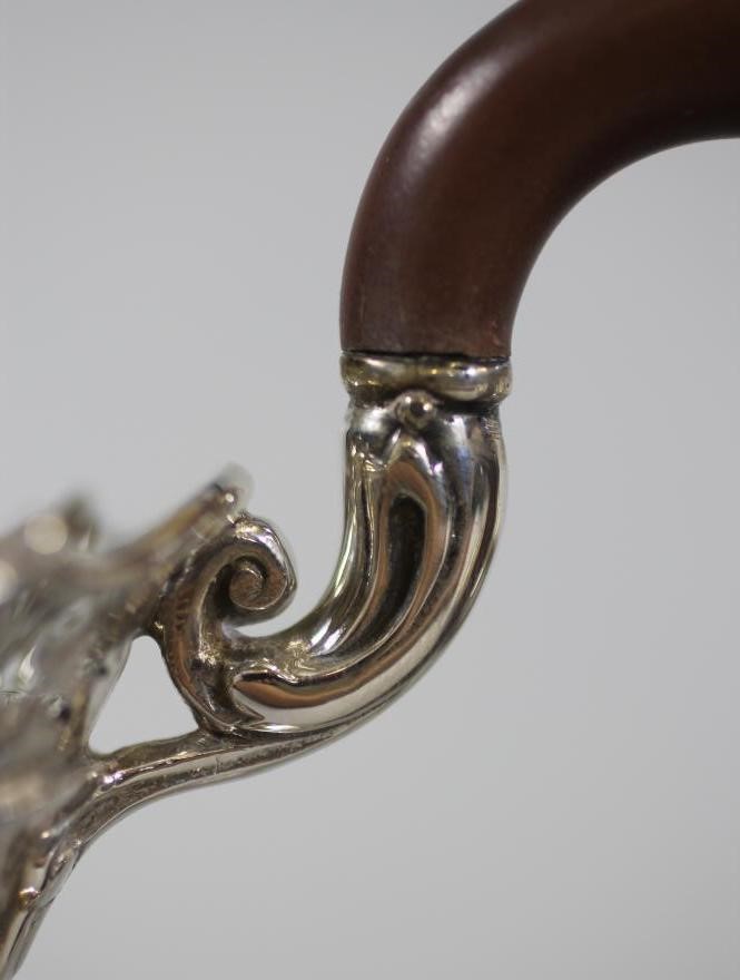 A COMPOSITE FOUR PIECE SILVER TEA AND COFFEE SERVICE Image