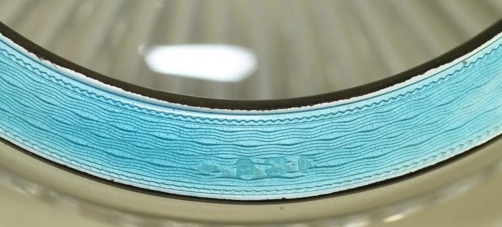 A COMPOSITE PAIR OF ART DECO SILVER SMALL DISHES Image