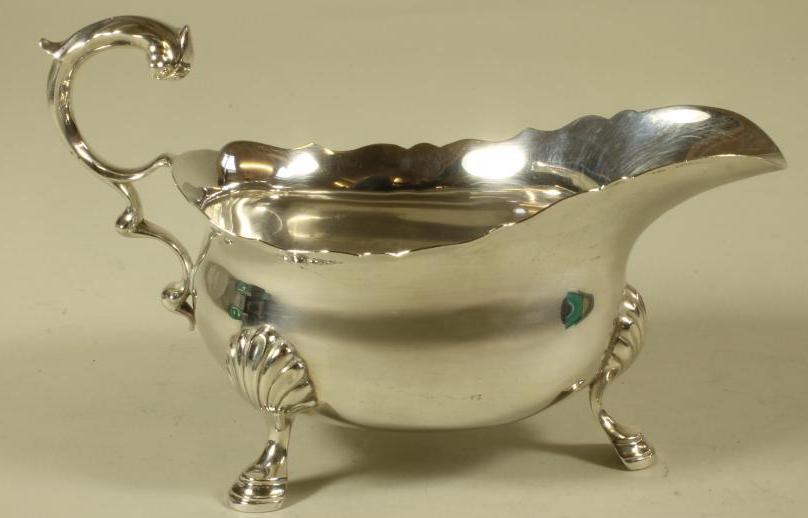 A LARGE SILVER SAUCE BOAT Image