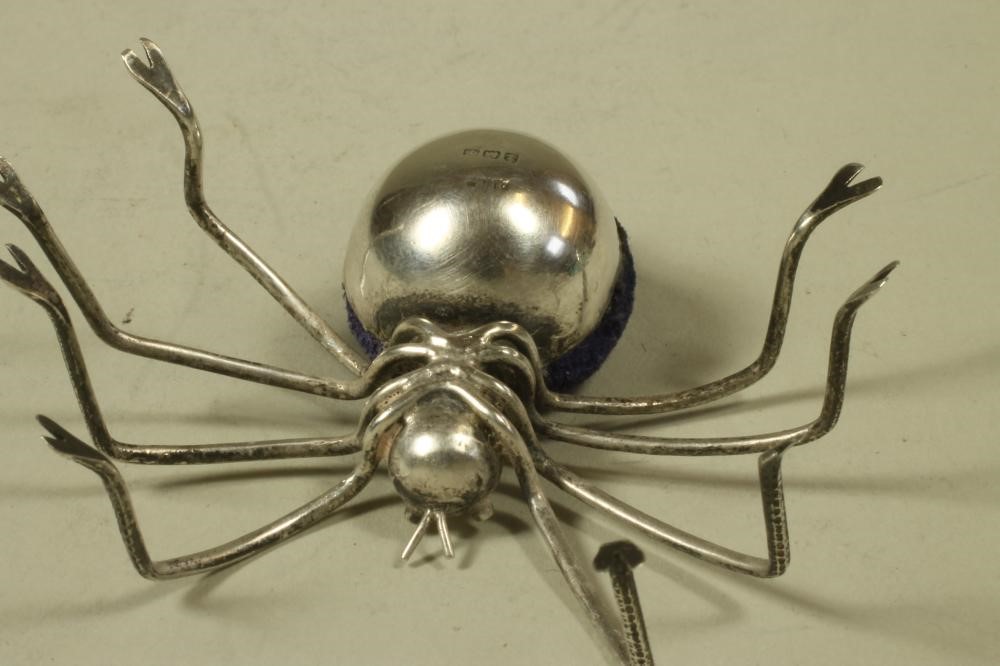 A SILVER NOVELTY PIN CUSHION Image