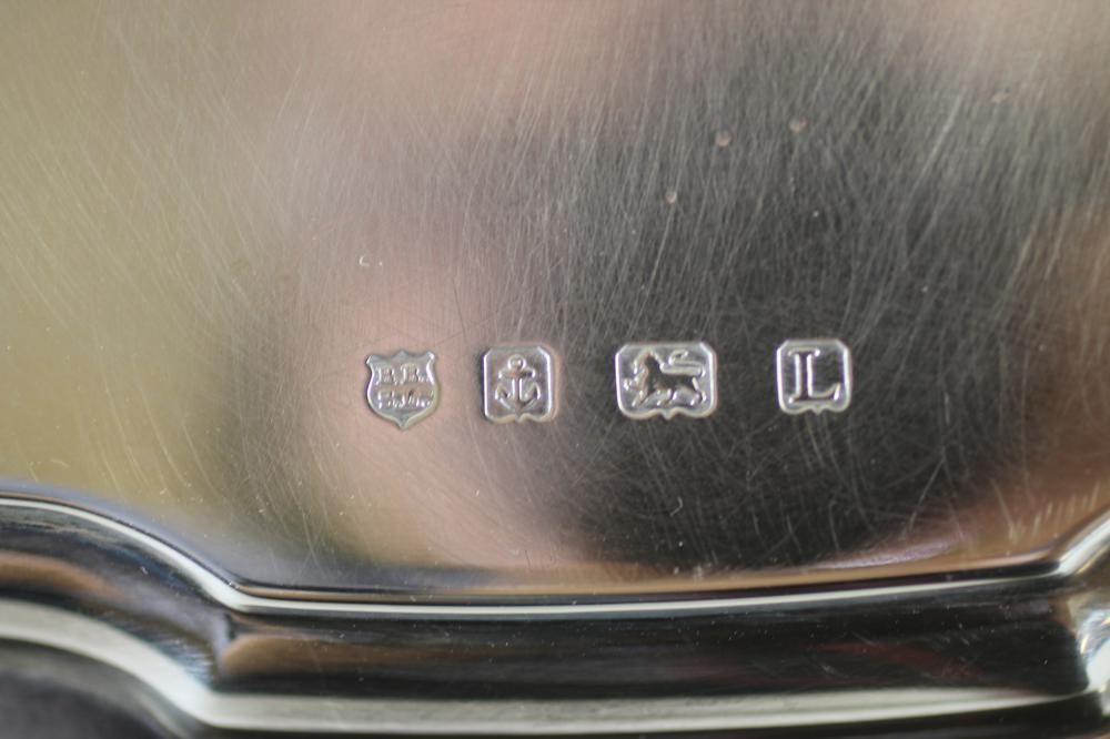 A SILVER TWO HANDLED TEA TRAY Image