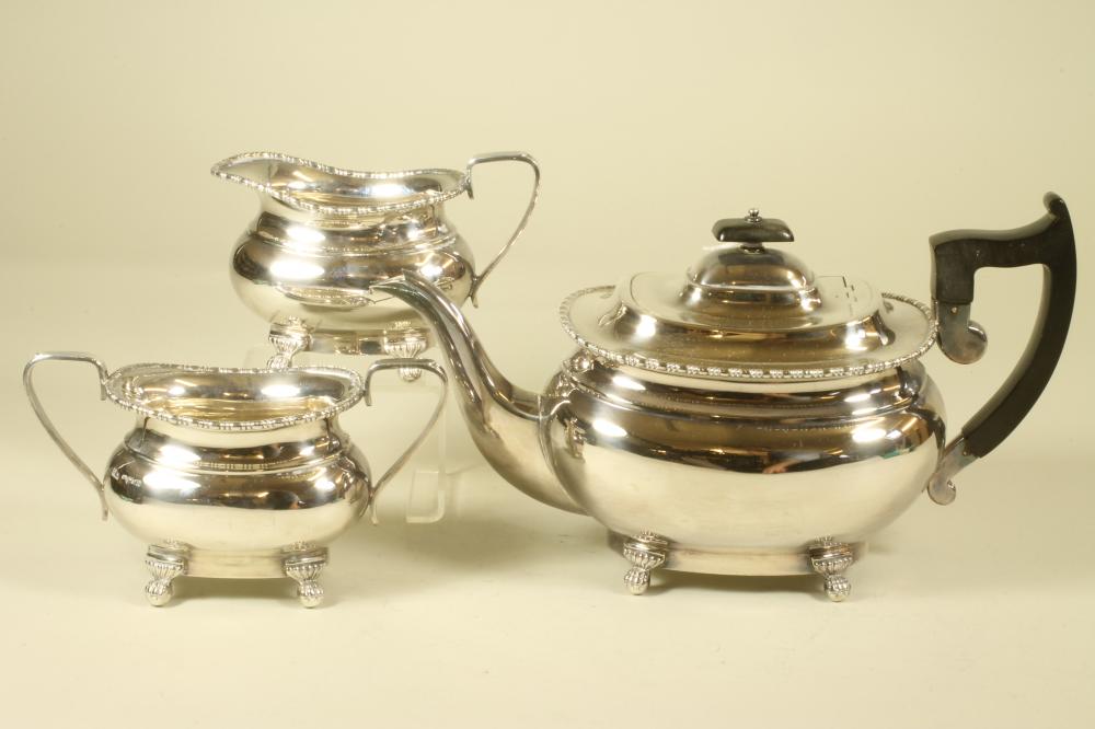 A THREE PIECE SILVER TEA SERVICE Image