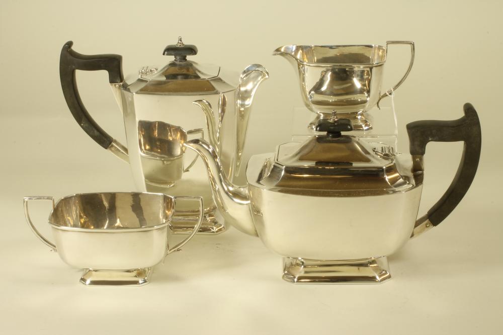 A COMPOSITE FOUR PIECE SILVER TEA SERVICE Image