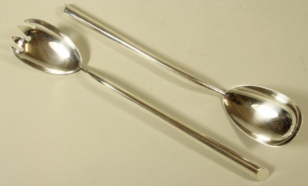 A PAIR OF SILVER SALAD SERVERS Image