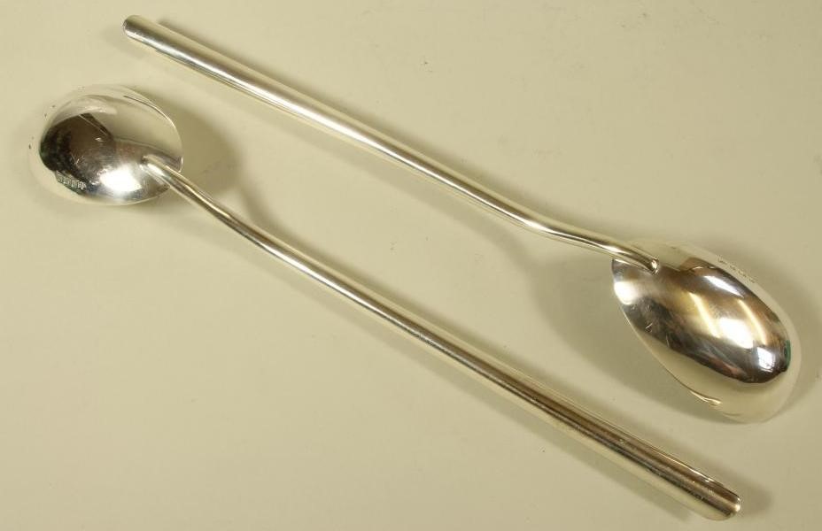 A PAIR OF SILVER SALAD SERVERS Image