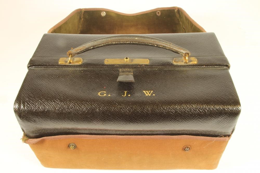 A GENTLEMAN'S SILVER TRAVELLING DRESSING CASE Image