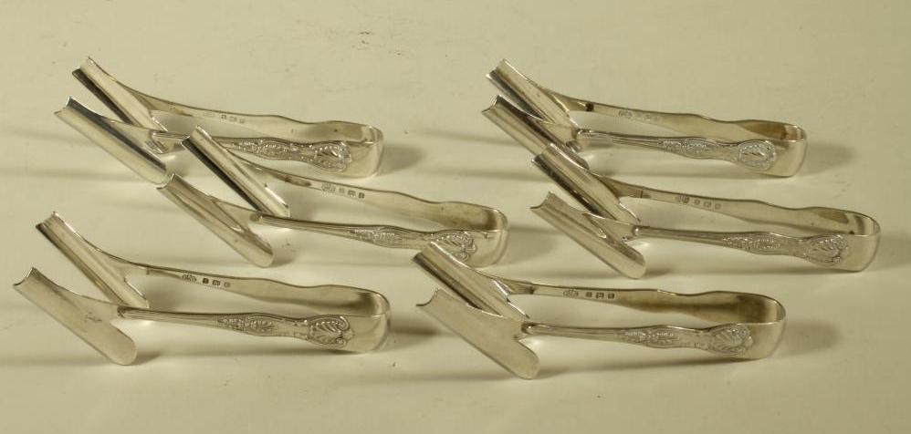 A SET OF SIX EDWARDIAN SILVER ASPARAGUS SERVERS Image