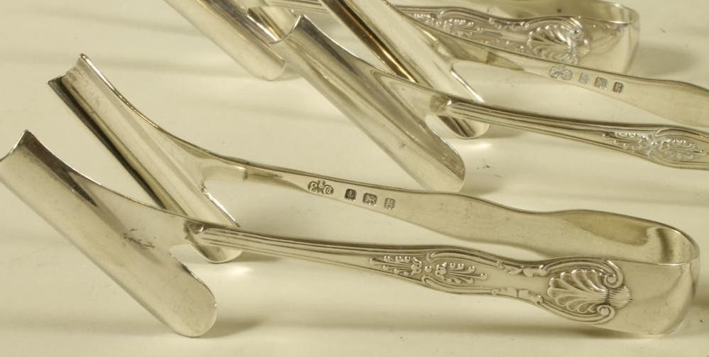 A SET OF SIX EDWARDIAN SILVER ASPARAGUS SERVERS Image
