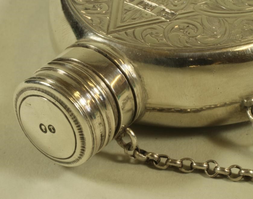 A MID VICTORIAN SILVER HIP FLASK Image