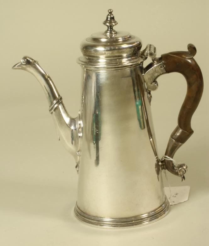 A GEORGE III SILVER COFFEE POT of tapering cylindrical form with hinged flat domed cover and urn Image