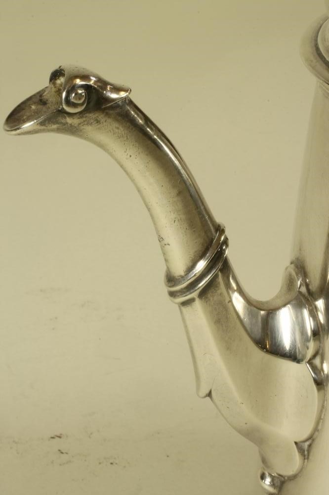 A GEORGE III SILVER COFFEE POT of tapering cylindrical form with hinged flat domed cover and urn Image