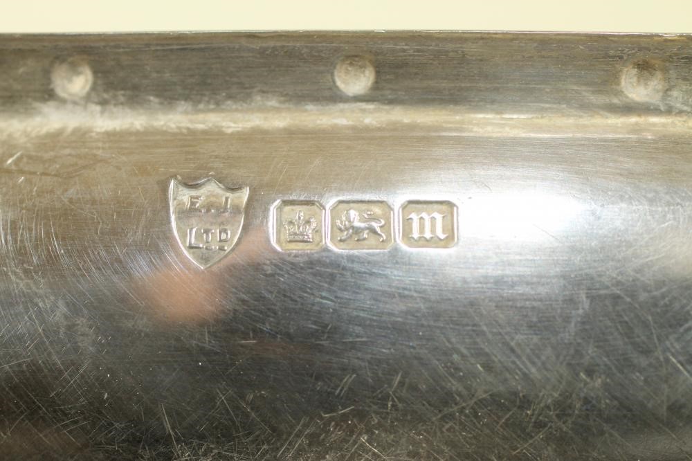 AN ARTS AND CRAFTS SILVER CHAMBERSTICK Image