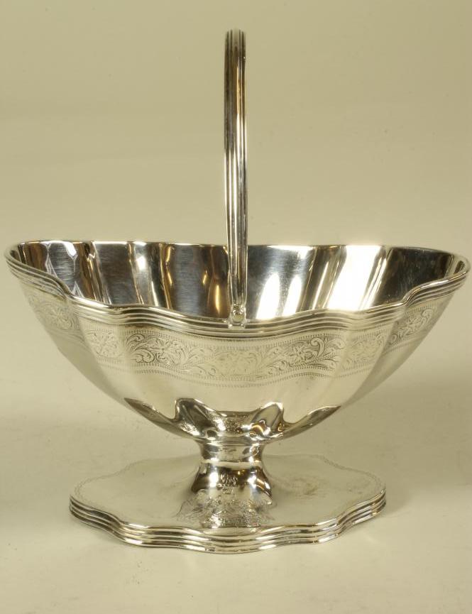AN EDWARDIAN SILVER SUGAR BASKET Image