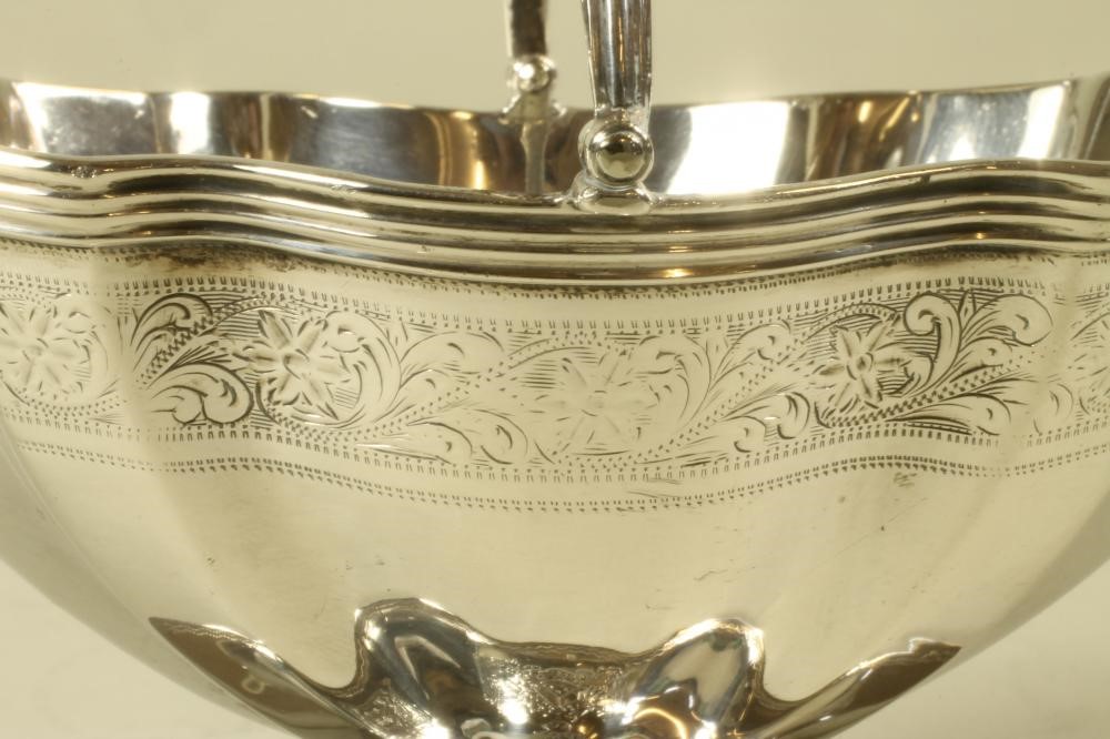 AN EDWARDIAN SILVER SUGAR BASKET Image