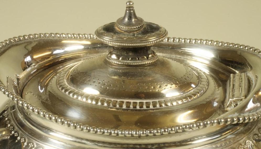 A VICTORIAN SILVER TEAPOT Image