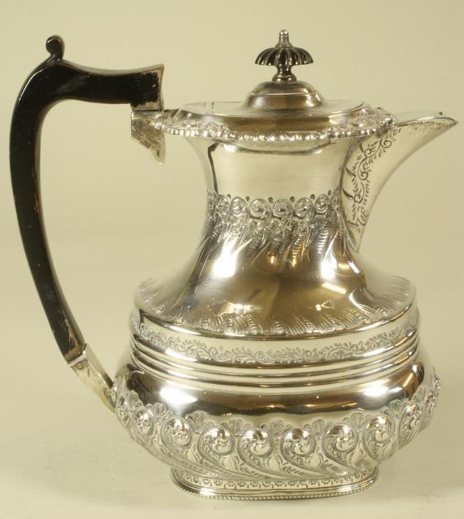 A LATE VICTORIAN SILVER COFFEE POT Image