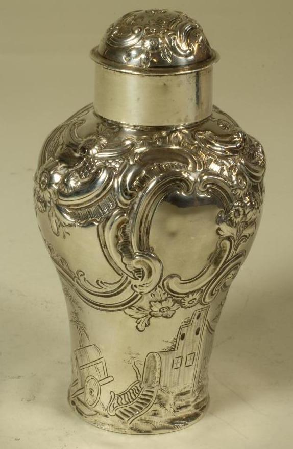 A GEORGE III SILVER TEA CADDY Image