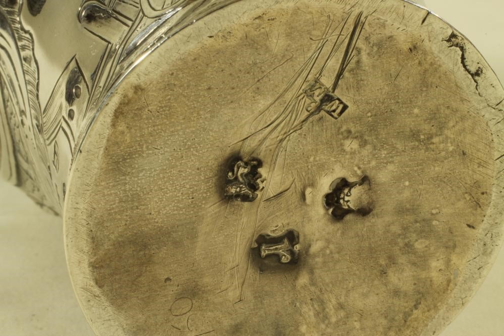 A GEORGE III SILVER TEA CADDY Image